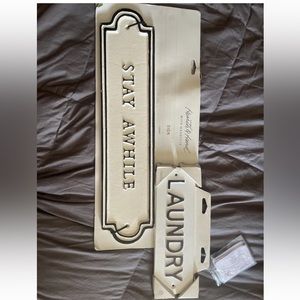 Stay awhile and Laundry signs